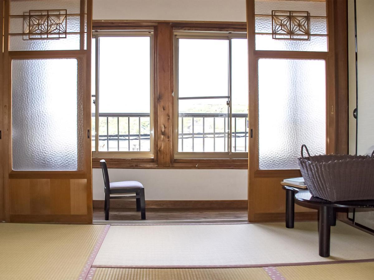 Guest Cafe Kuchikumano Hotel Kamitondacho Bagian luar foto
