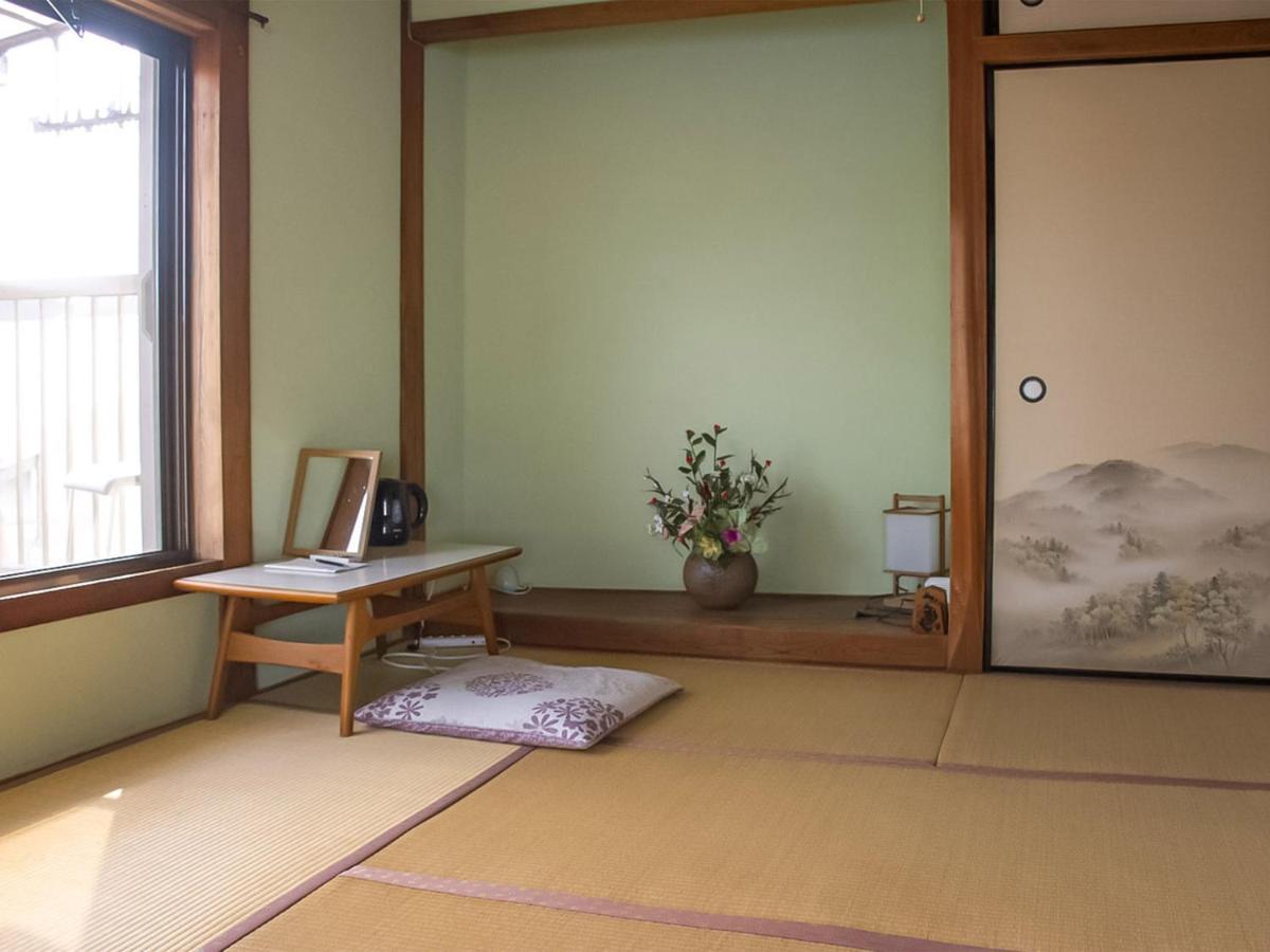 Guest Cafe Kuchikumano Hotel Kamitondacho Bagian luar foto