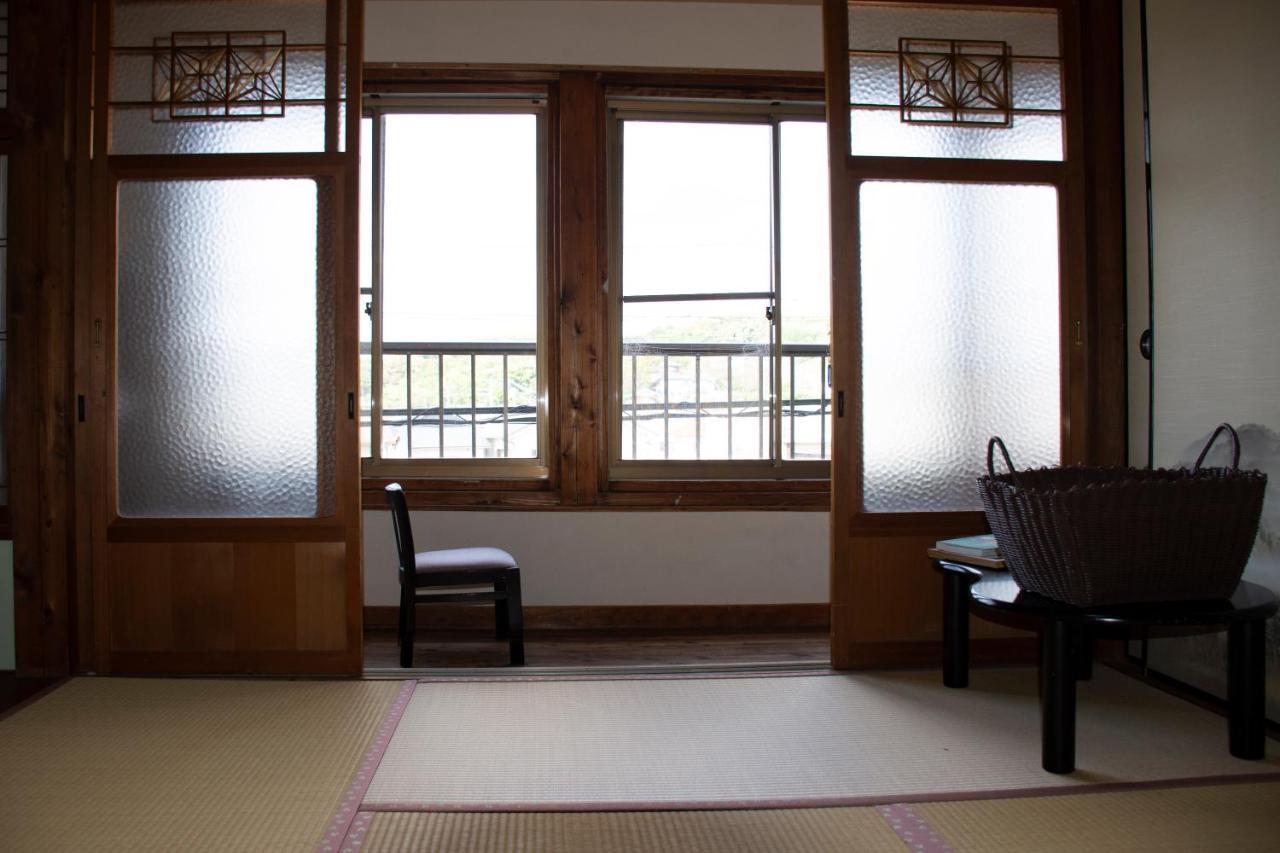 Guest Cafe Kuchikumano Hotel Kamitondacho Bagian luar foto
